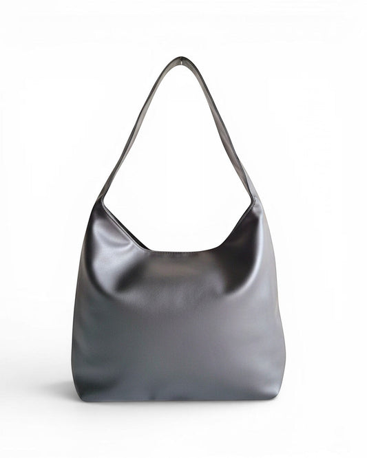 ms ADAM black PU leather vintage shoulder bag with magnetic snap closure and one main compartment.