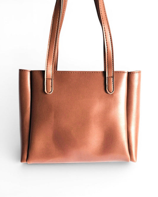 ms ADAM brown faux leather tote bag with fixed shoulder straps and zip closure. Includes a separate pouch.