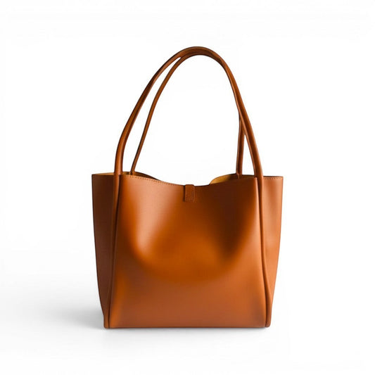ms ADAM brown faux leather tote bag with shoulder straps and magnetic snap closure, spacious main compartment.