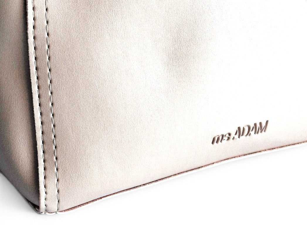ms ADAM beige faux leather top handle bag with zip closure, two compartments, and detachable shoulder strap.