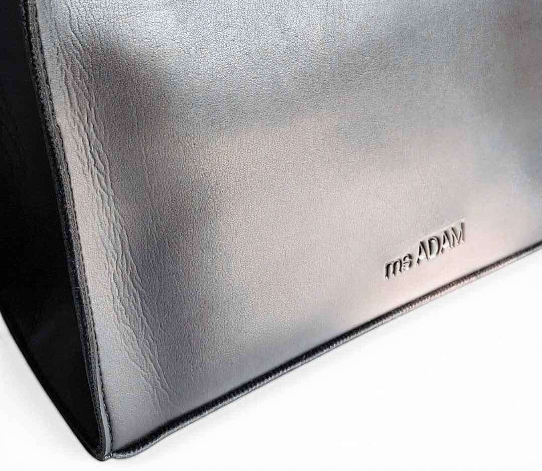 ms ADAM black faux leather tote bag with two compartments and zip closure, unadorned texture.