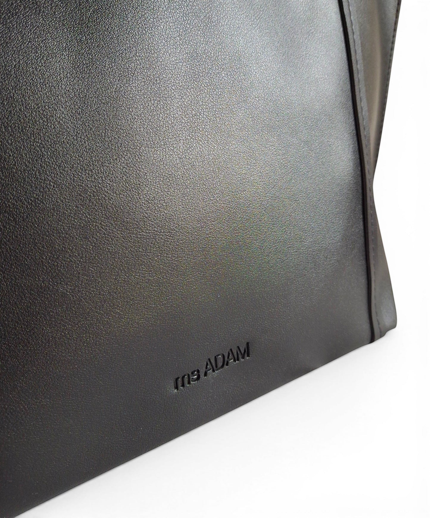 ms ADAM black faux leather tote bag with magnetic snap closure and one main compartment.