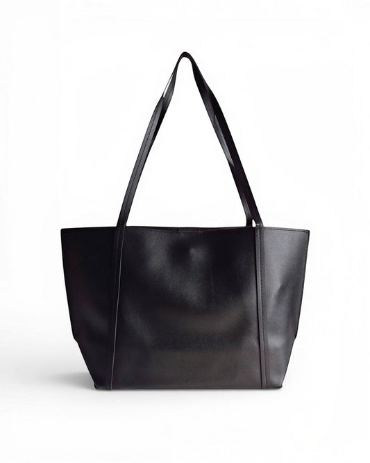 ms ADAM Go Easy black faux leather tote bag with shoulder straps and magnetic snap closure.