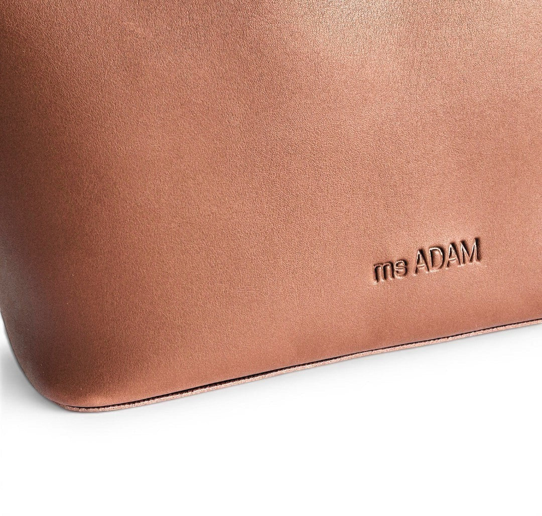 ms ADAM brown faux leather tote bag with a zip closure and one main compartment.