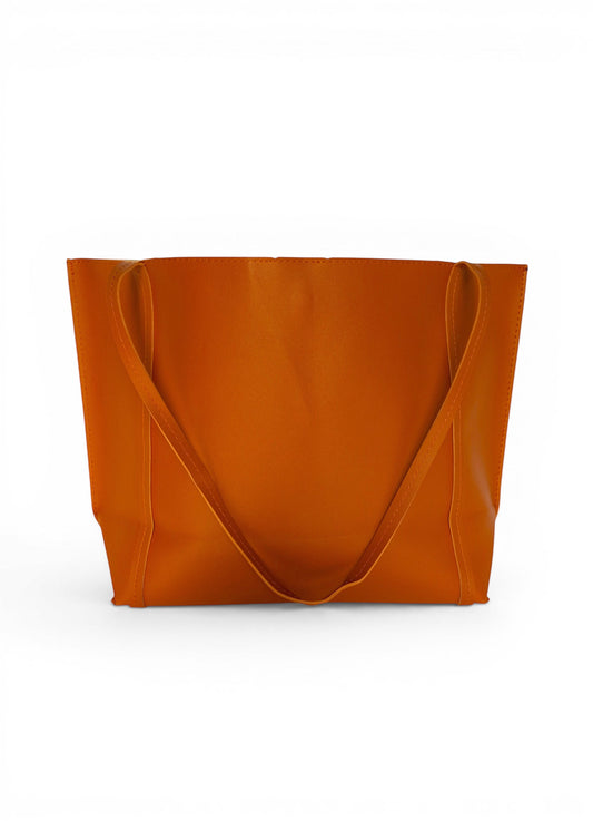 ms ADAM Go Easy Tote in rich brown faux leather. Spacious, unadorned design with shoulder straps and magnetic snap closure.