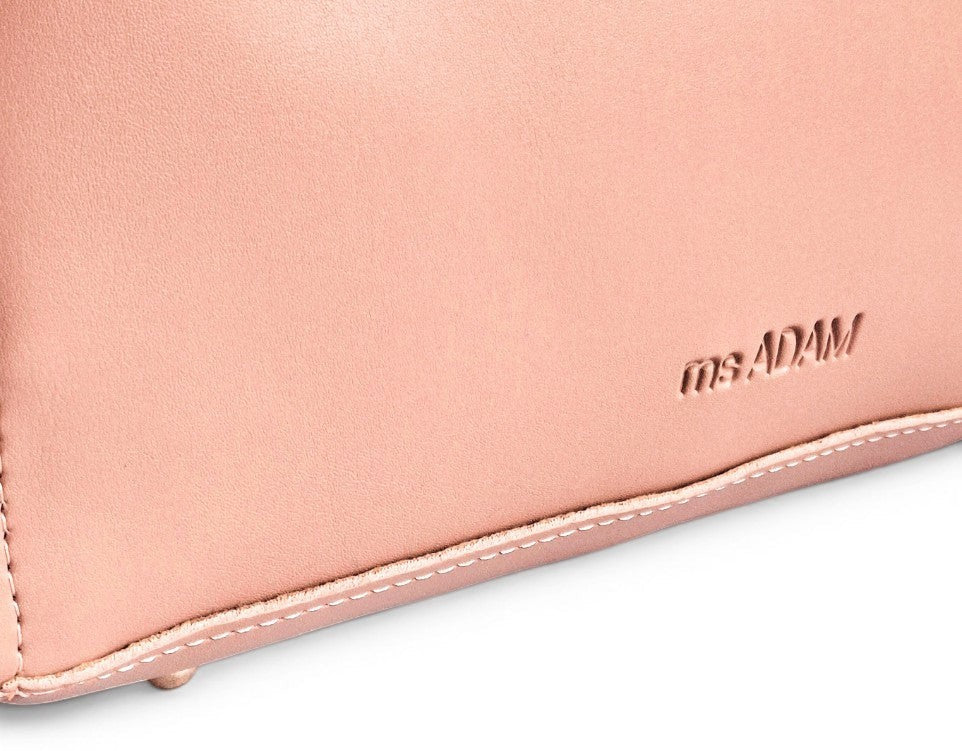 ms ADAM pink peach faux leather tote bag with zip closure and fixed shoulder straps.