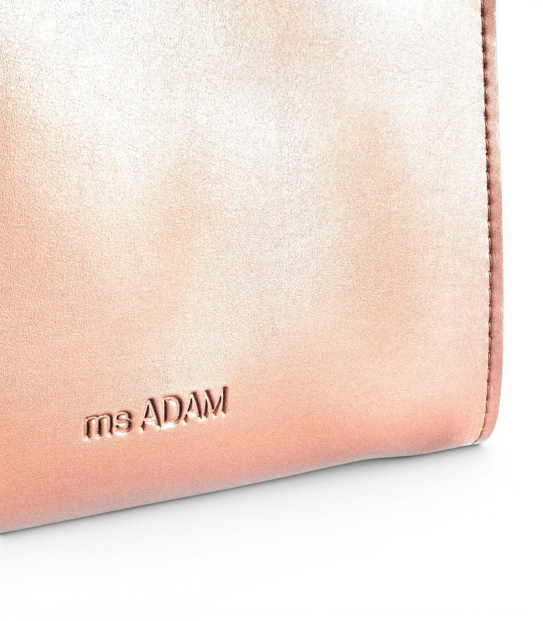 ms ADAM rose gold faux leather bucket shoulder bag with zip closure and adjustable strap.