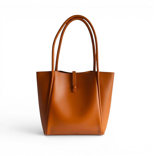 ms ADAM brown faux leather tote bag with shoulder straps and magnetic snap closure, spacious main compartment.