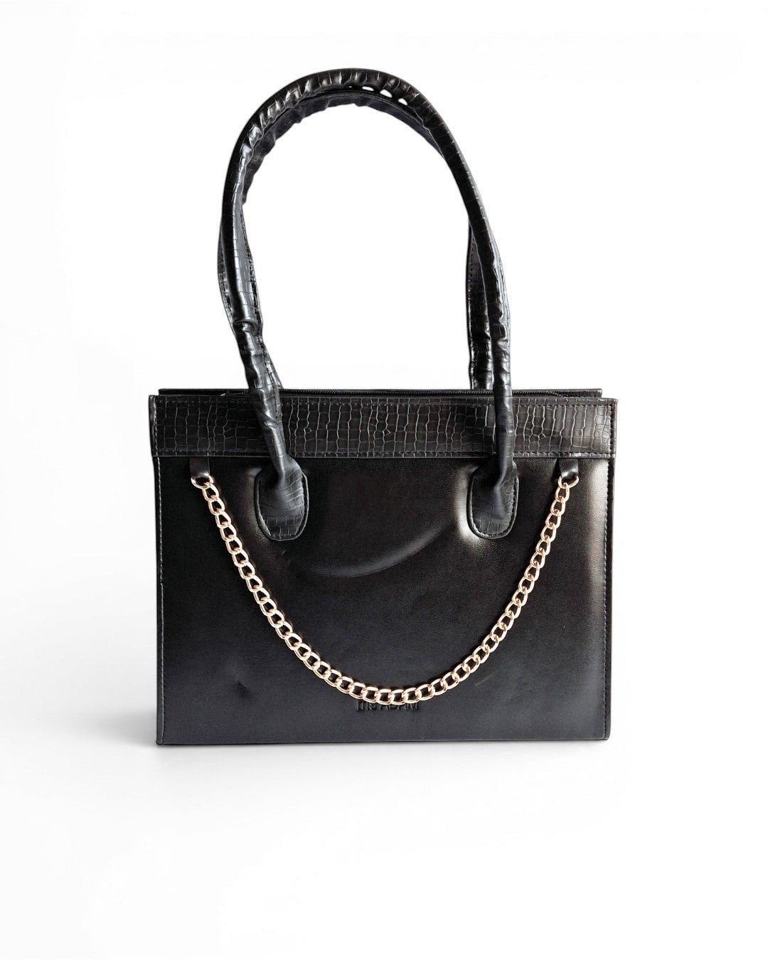 ms ADAM black faux leather top handle bag with gold chain detail and zip closure. Croc-embossed trim.