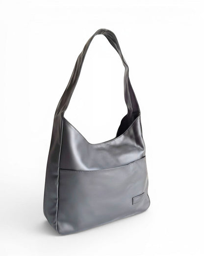 ms ADAM black PU leather vintage shoulder bag with magnetic snap closure and one main compartment.