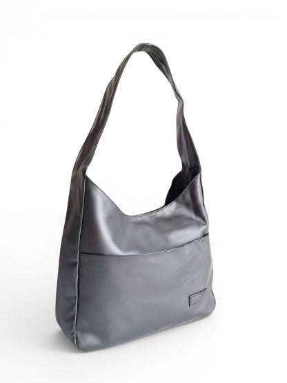 ms ADAM black PU leather vintage shoulder bag with magnetic snap closure and one main compartment.