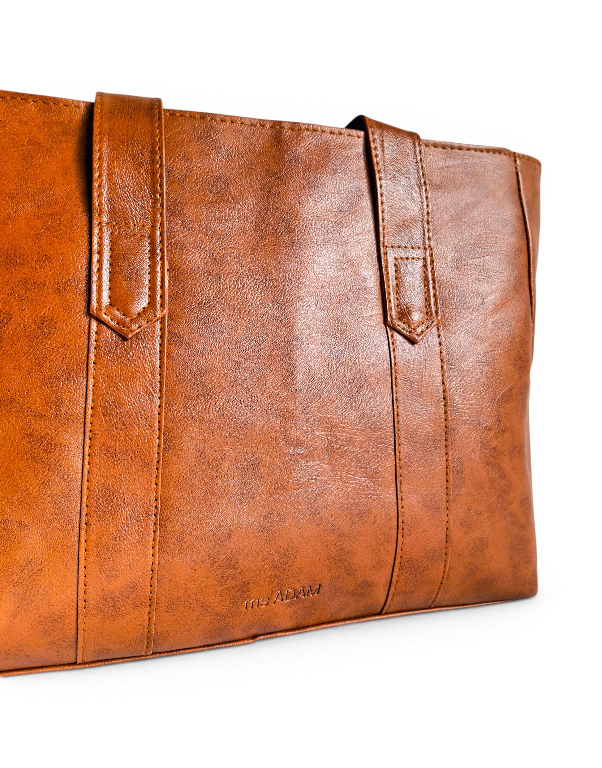 ms ADAM brown PU leather tote bag with self-print texture, shoulder straps, and zip closure.