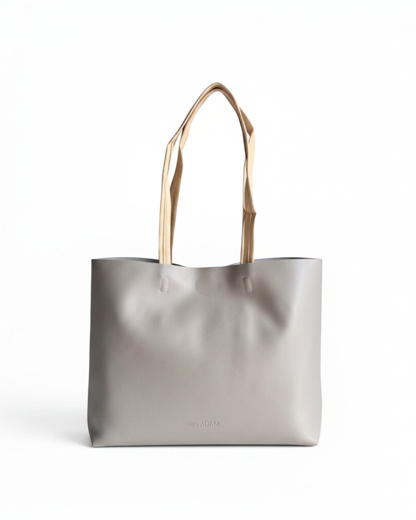 ms ADAM minimalist stone gray faux leather tote bag with contrast tan straps and magnetic snap closure.