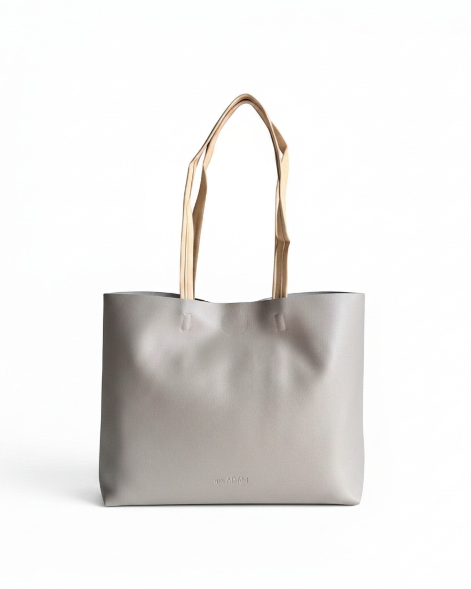 ms ADAM minimalist stone gray faux leather tote bag with contrast tan straps and magnetic snap closure.