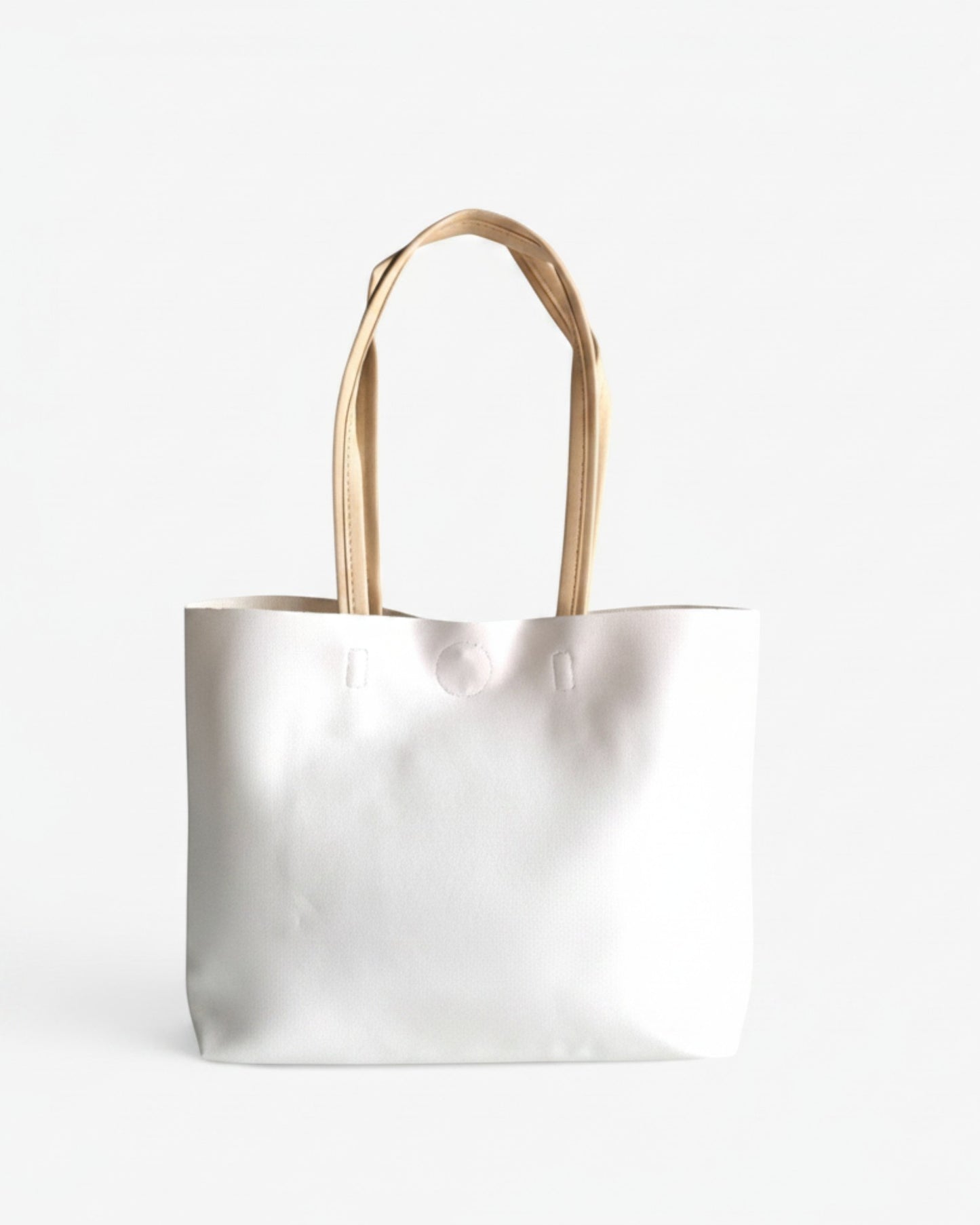 ms ADAM white faux leather minimalist tote bag with cream shoulder straps and magnetic snap closure.