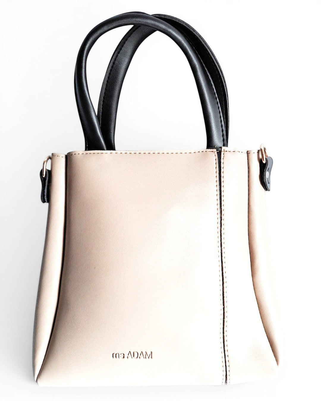 ms ADAM beige and black faux leather top handle bag with one main compartment and zip closure.