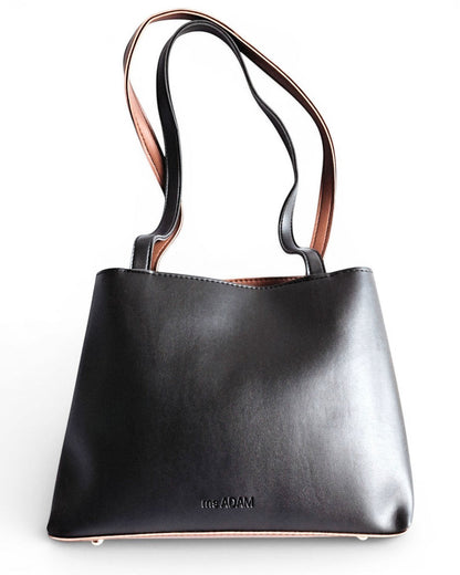 ms ADAM black faux leather tote bag with brown straps and zip closure. Includes pouch and wallet.