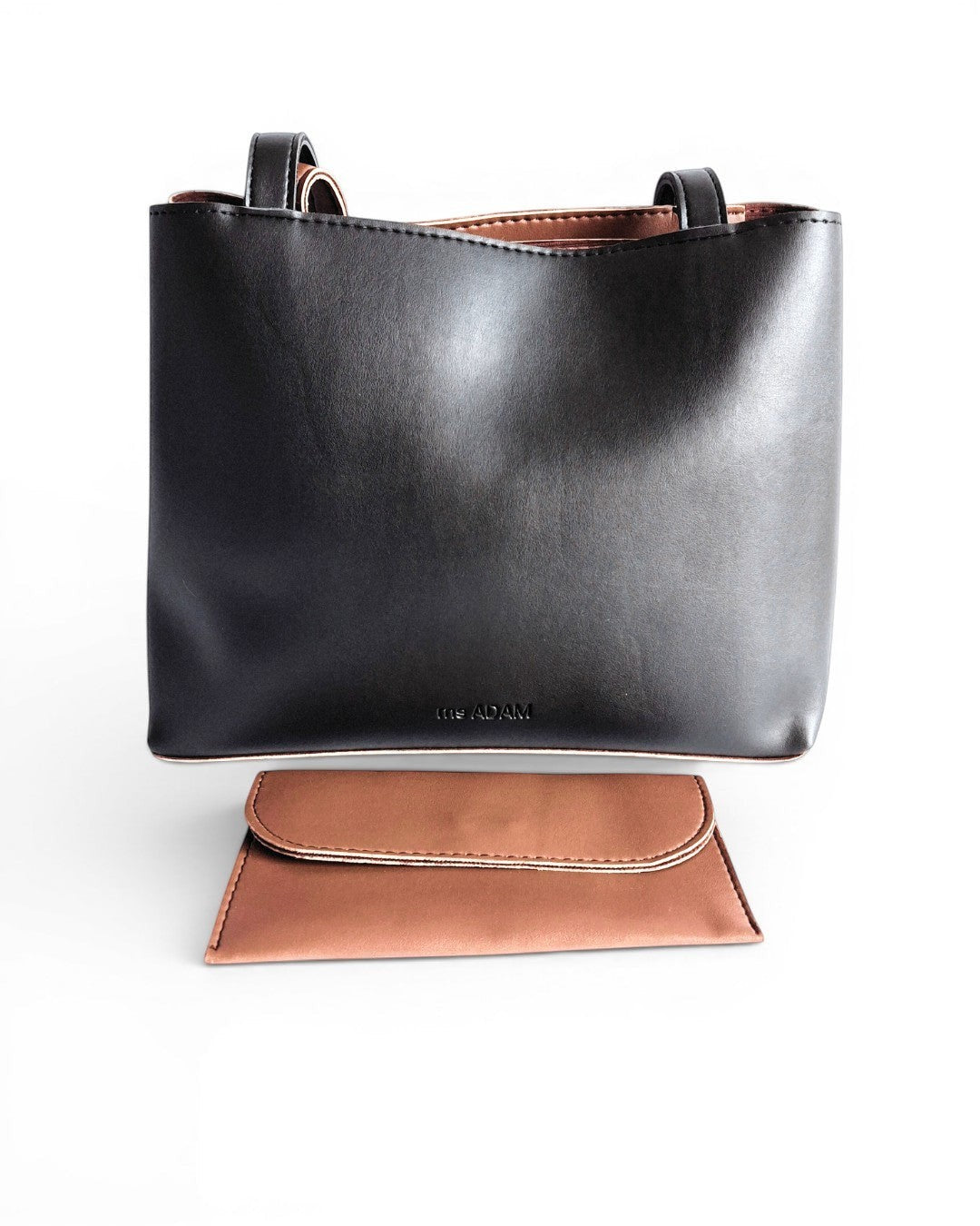 ms ADAM black faux leather tote bag with brown trim and matching clutch. Shoulder bag with fixed straps and zip closure.
