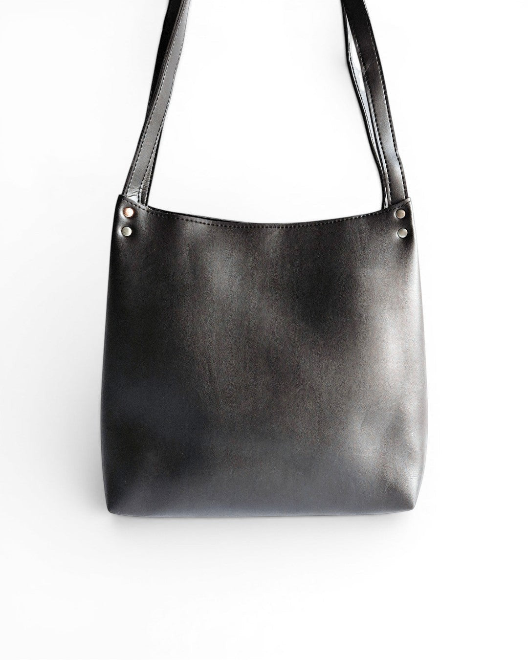 ms ADAM black faux leather bucket shoulder bag with zip closure and fixed straps.