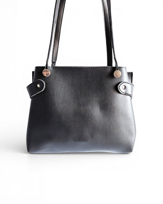 ms ADAM The Blow black faux leather tote bag with fixed shoulder straps and zip closure.