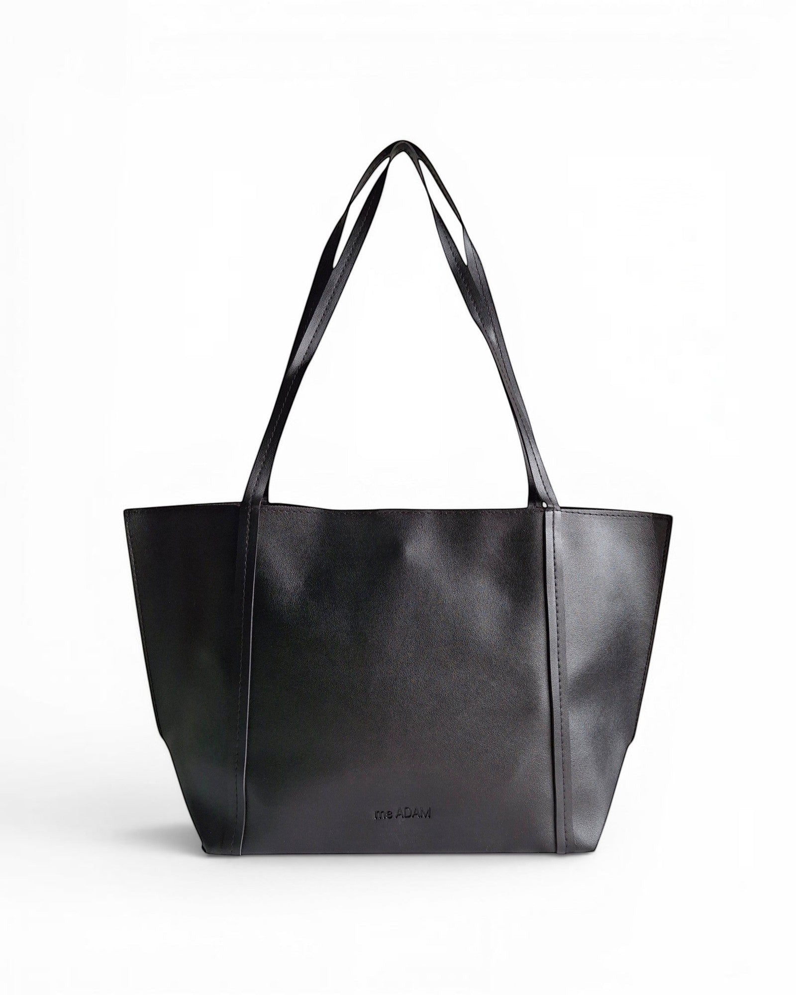 ms ADAM black faux leather tote bag with shoulder straps and magnetic snap closure.
