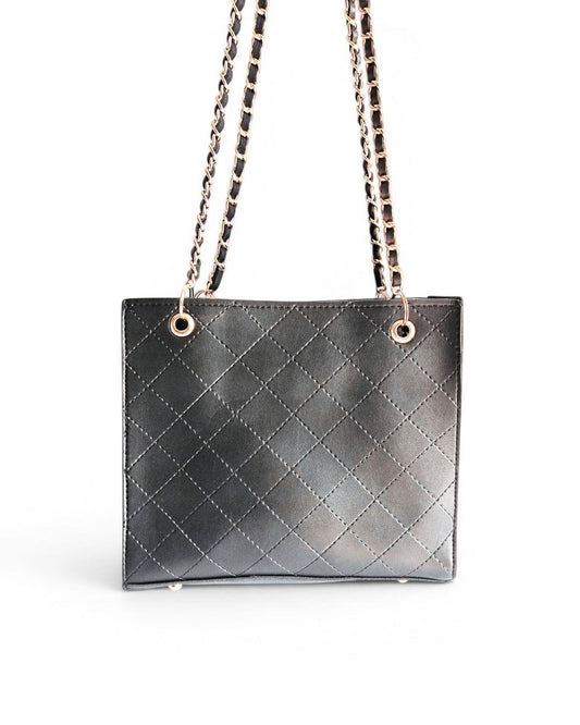 ms ADAM black faux leather quilted tote bag with chain straps and zip closure. Two compartments.