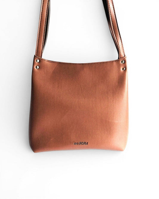 ms ADAM The Regular brown faux leather shoulder bag with zip closure and one main compartment.
