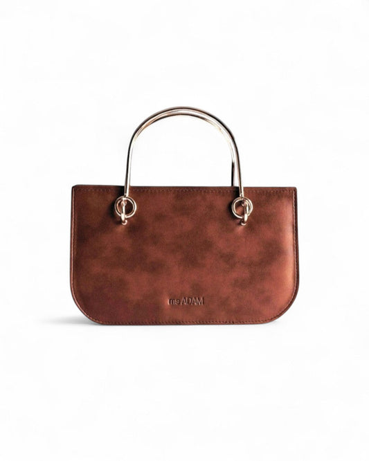 ms ADAM brown faux leather top handle bag with a self-print texture and gold hardware. Includes detachable strap and zip closure.