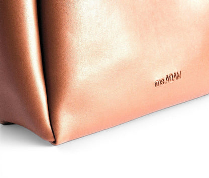 ms ADAM brown faux leather tote bag with fixed shoulder straps and zip closure. Unadorned texture.