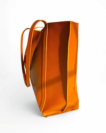 ms ADAM Go Easy Tote in brown faux leather with shoulder straps and a structured design.