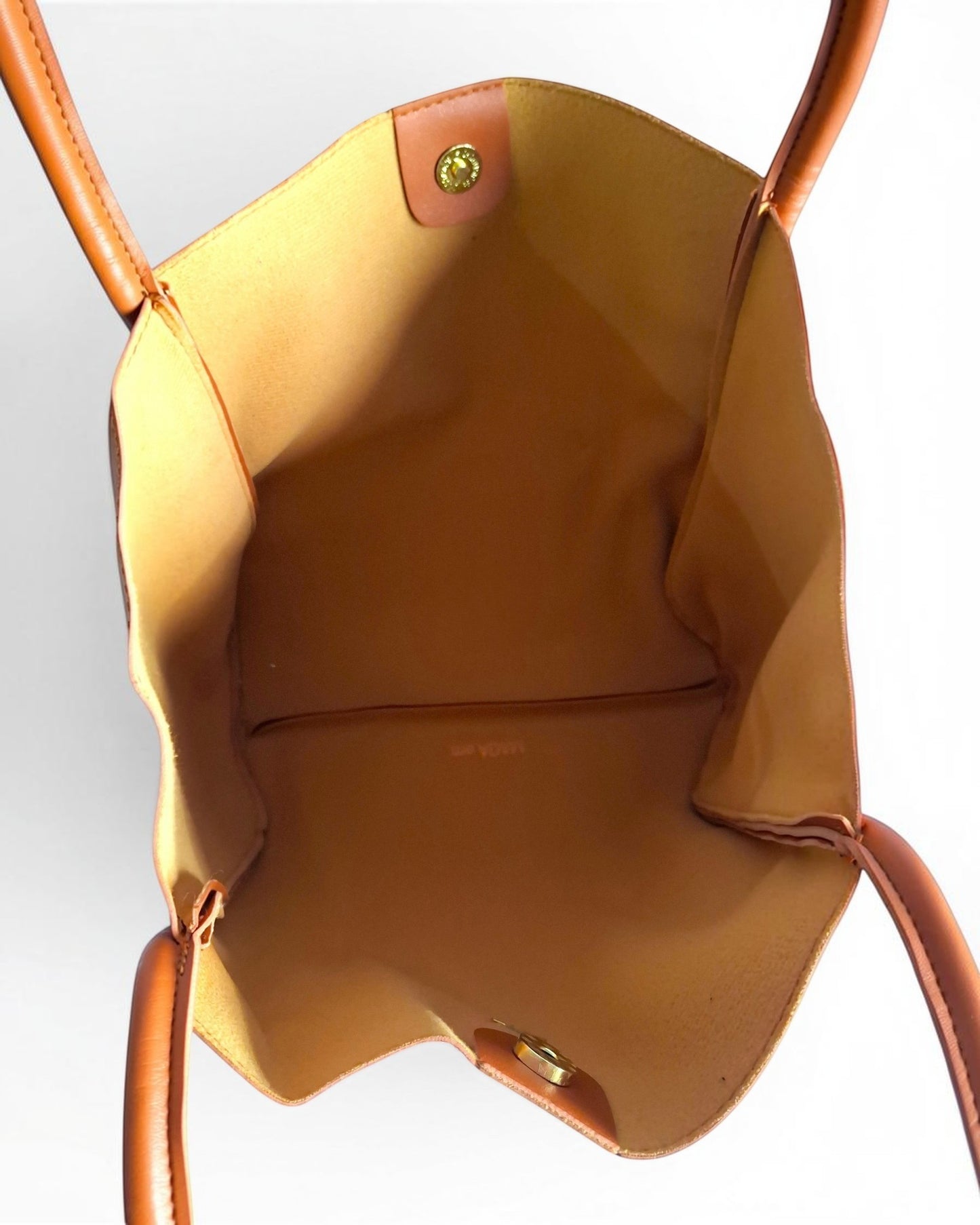 ms ADAM brown faux leather tote bag with magnetic snap closure and shoulder straps.