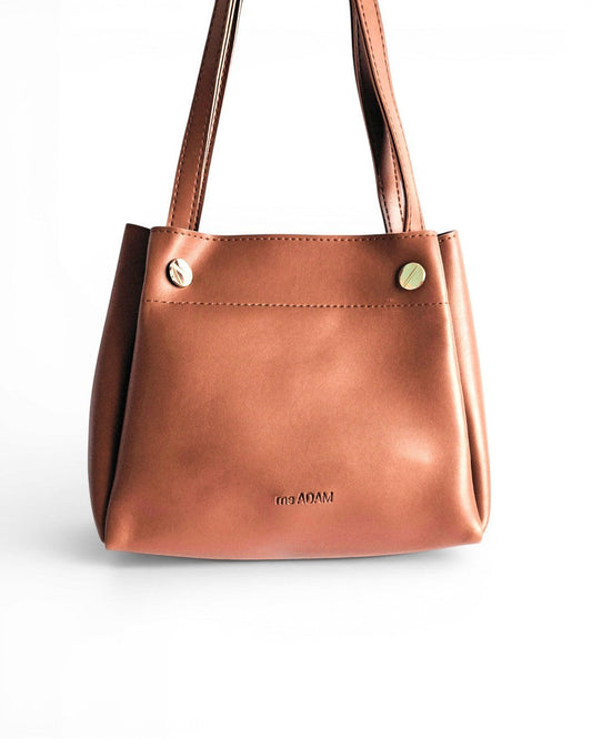 ms ADAM brown faux leather tote bag with fixed shoulder straps and zip closure. Features one main compartment and unadorned texture.