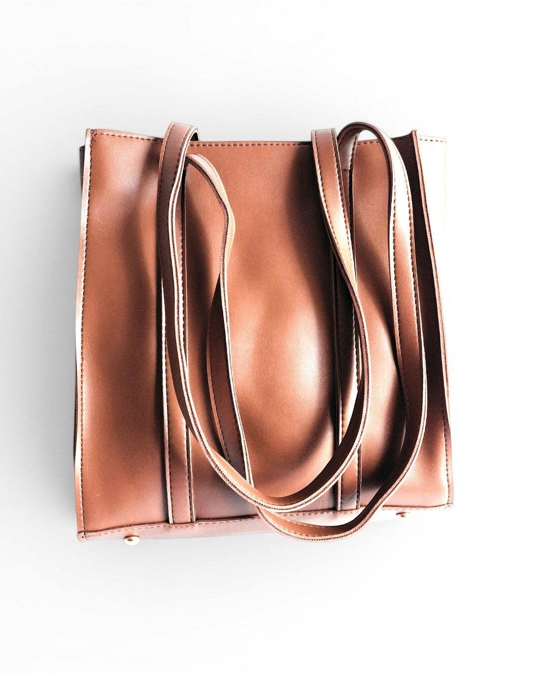ms ADAM brown faux leather upright tote bag with shoulder straps and zip closure.