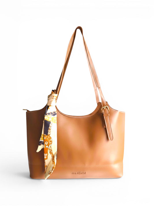 ms ADAM brown faux leather tote bag with shoulder straps and a decorative scarf tied to the handle.