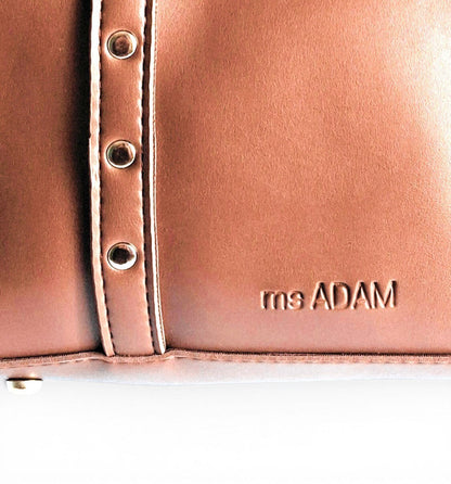 ms ADAM brown faux leather tote bag with silver stud details and zip closure. One main compartment.