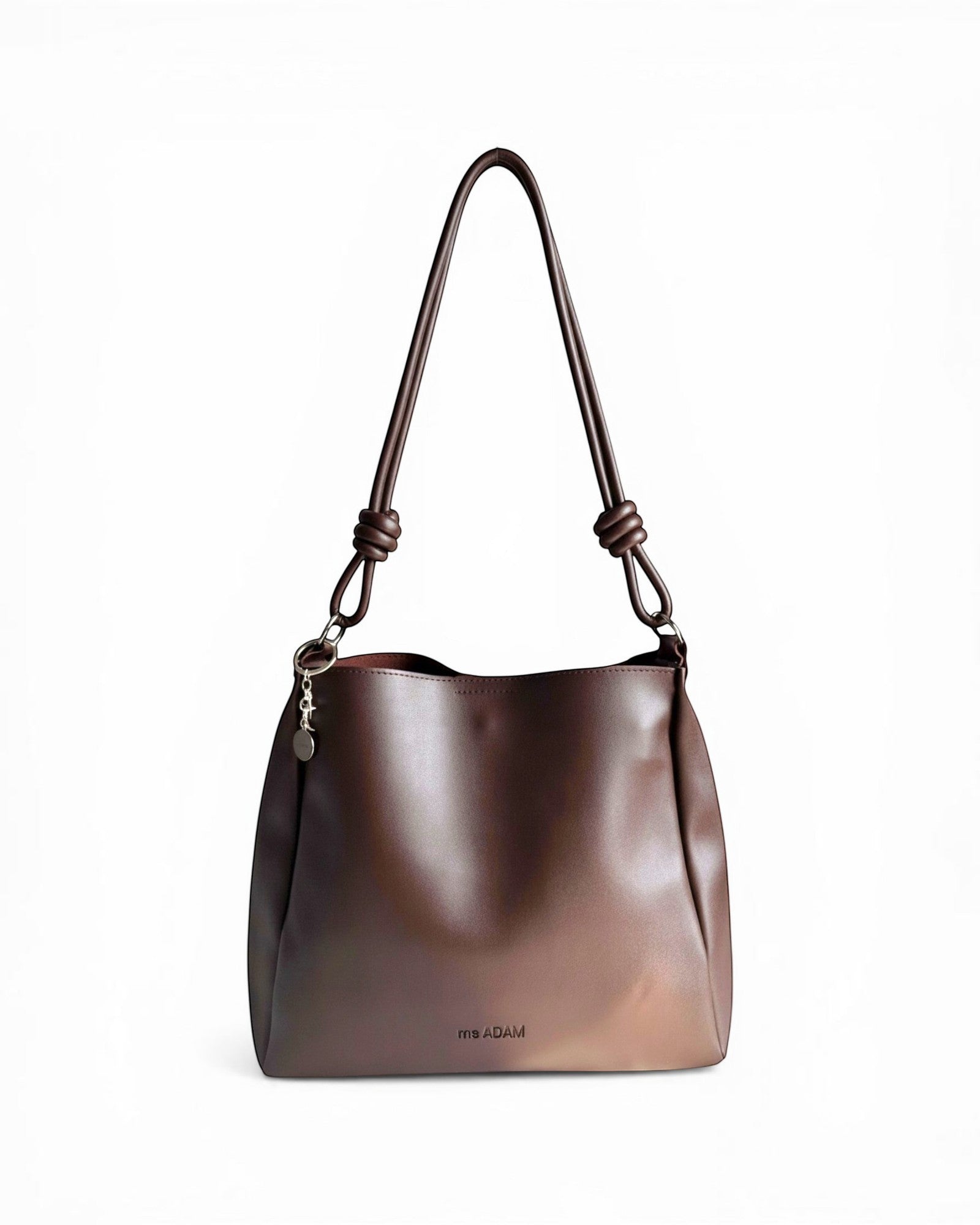 ms ADAM C Bean shoulder bag in coffee brown faux leather with magnetic snap closure and keychain charm.
