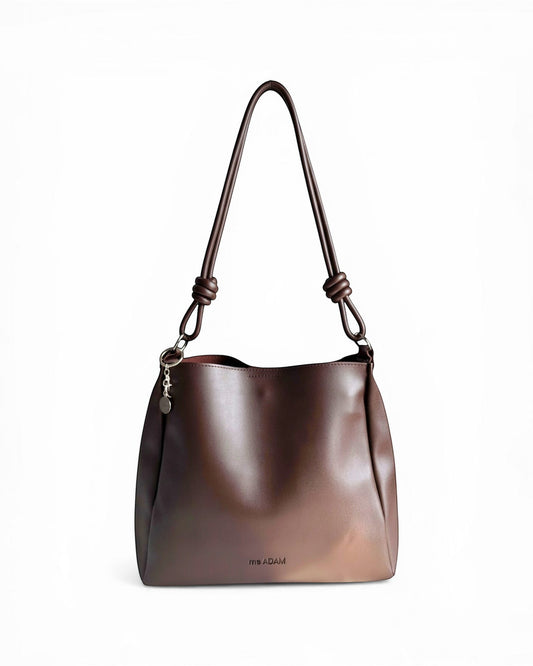 ms ADAM C Bean shoulder bag in coffee brown faux leather with magnetic snap closure and keychain charm.