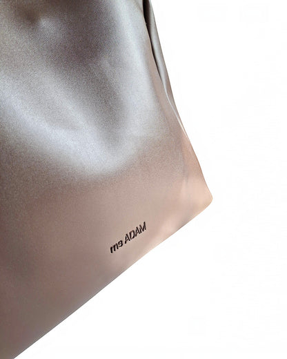 ms ADAM C Bean shoulder bag in coffee brown faux leather with magnetic snap closure and embossed logo.